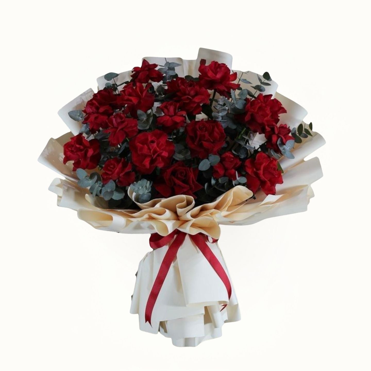 Bouquet of red flowers with a white ribbon on a white background
