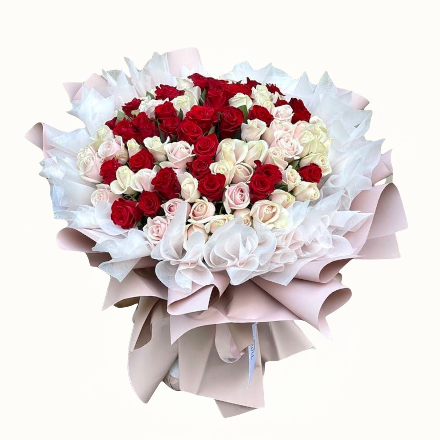 Bouquet of red, white, and pink roses with decorative paper wrap on a white background