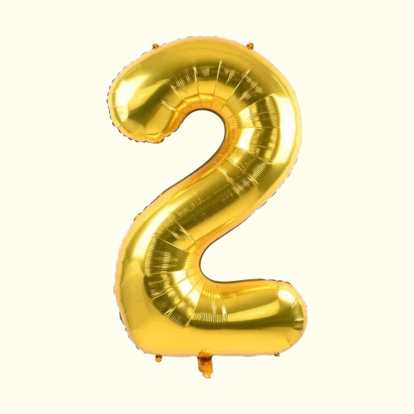 Gold number 2 balloon on a white background