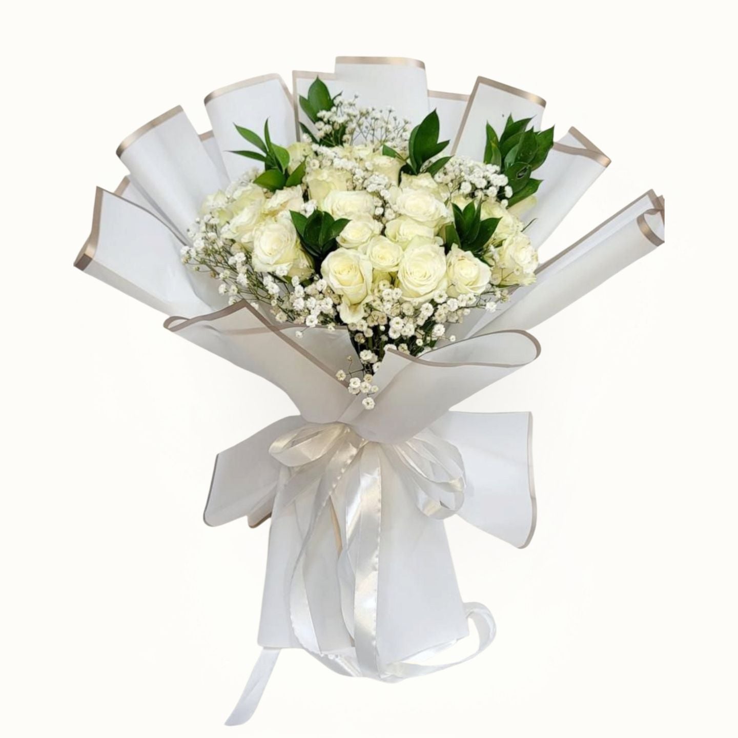 Bouquet of white flowers wrapped in white paper | White Roses Bouquet Dubai, UAE