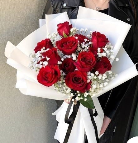 Red Roses and gypsophila white flower bouquet 
