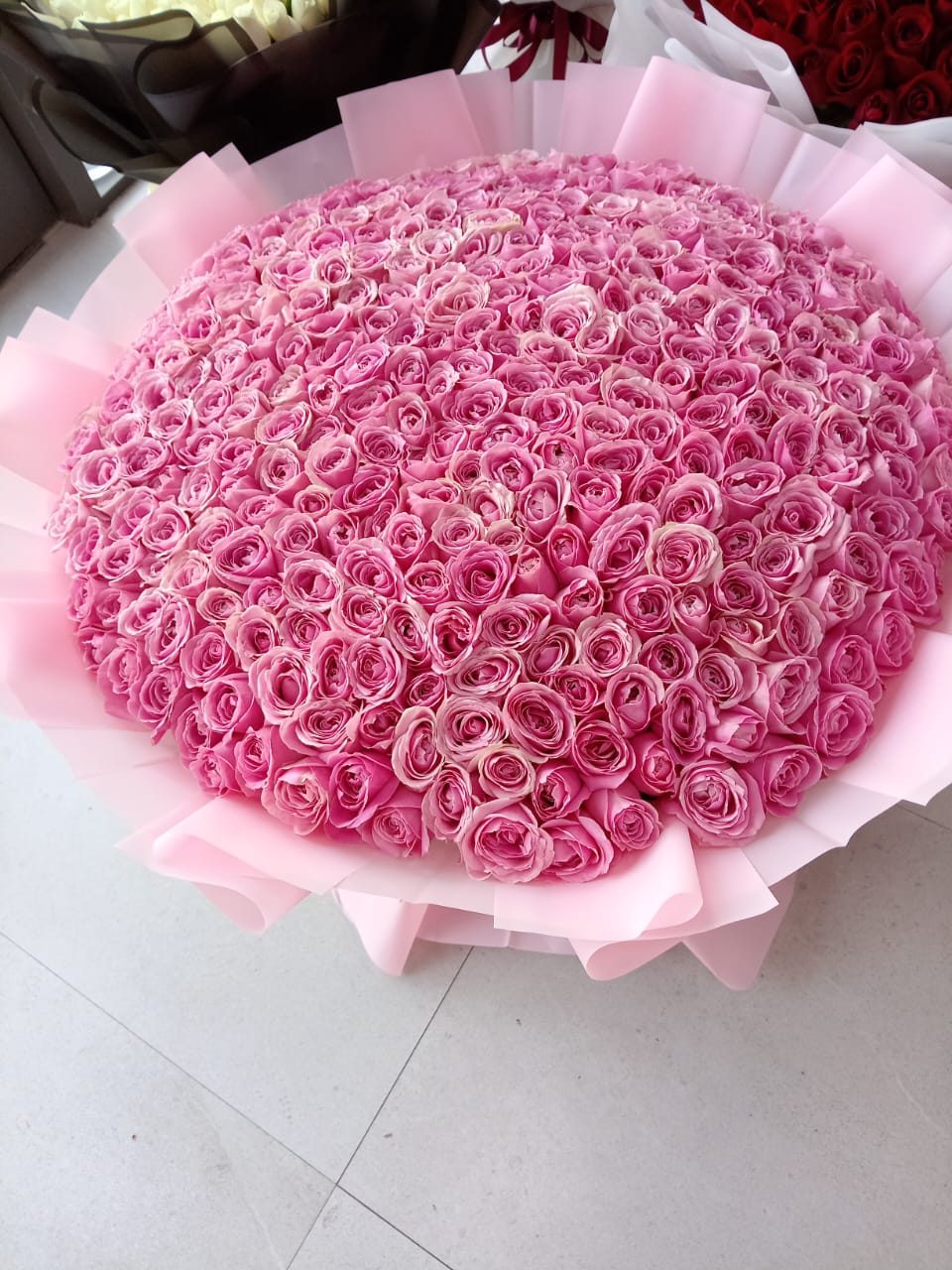 Pink Flower bouquet with 500 pink roses and pink wrapping 