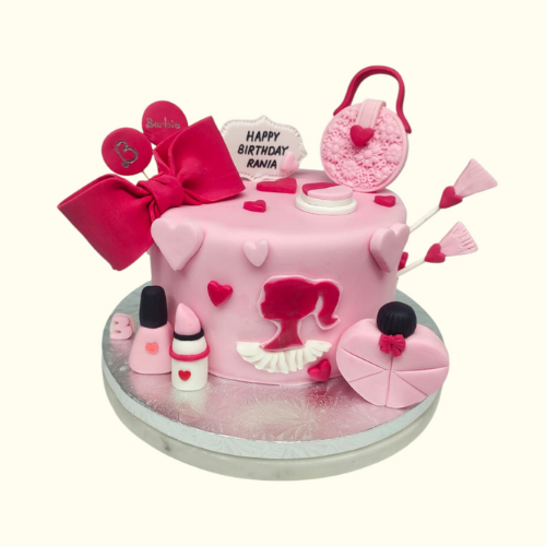 Pink birthday cake with decorative elements | Barbie Cake for Dubai 