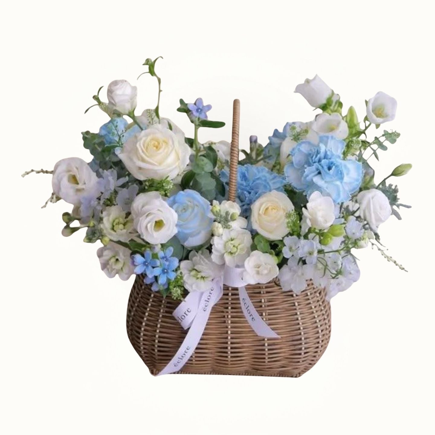 Floral arrangement in a woven basket with white, blue, and green flowers on a white background