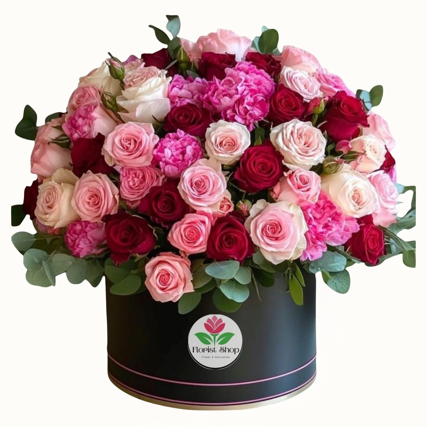 Assorted pink, red, and white roses in a black box. 