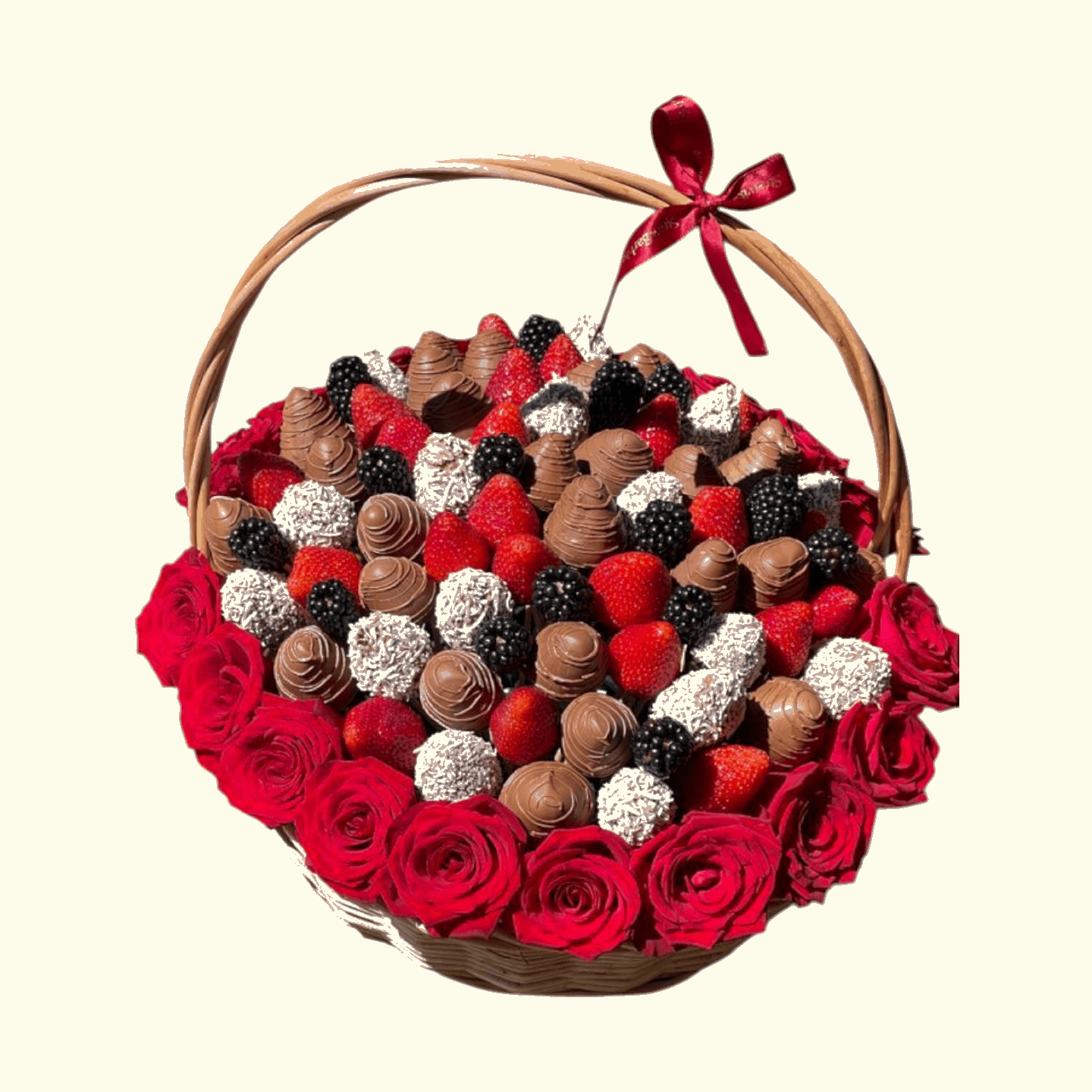Heart-shaped basket filled with red roses, chocolates, and berries on a beige background