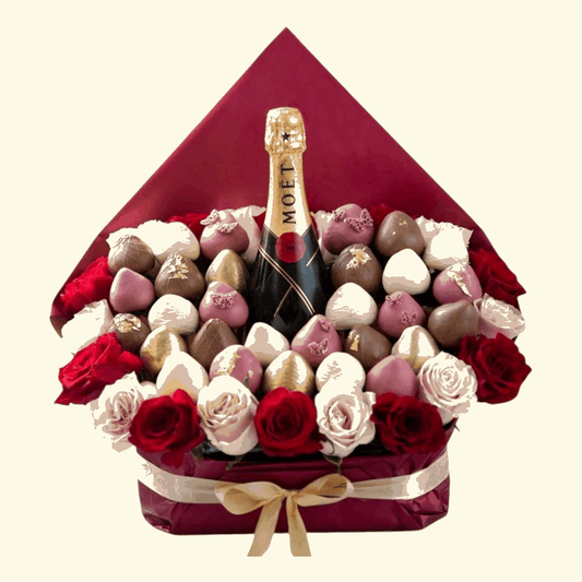 Bouquet of flowers with chocolates and a bottle of Moet champagne on a beige background