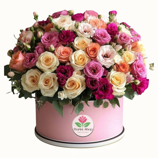 Colorful bouquet of roses in a pink box with 'Florist Shop' logo.