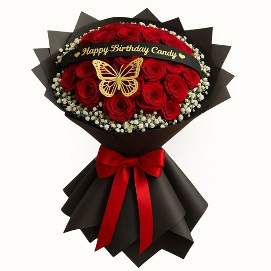 Bouquet of red roses with a gold butterfly and red ribbon, labeled 'Happy Birthday Candy'.