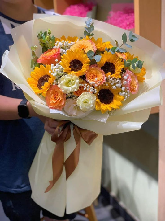 sunflower bouquet with yellow roses flower bouquet in Dubai, UAE 