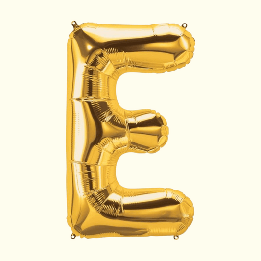 Gold letter 'E' balloon on a white background
