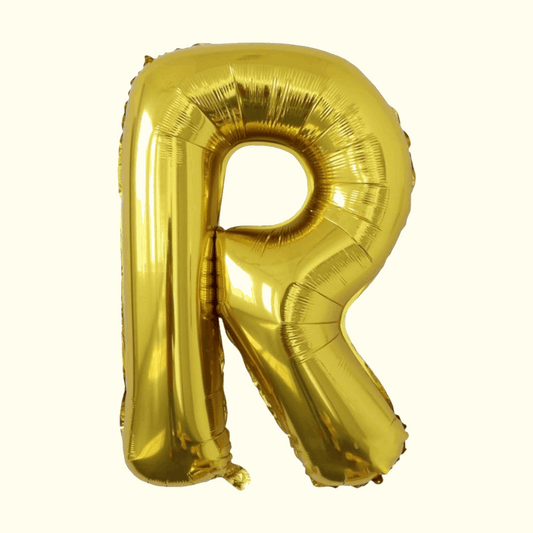 Gold letter 'R' balloon on a white background