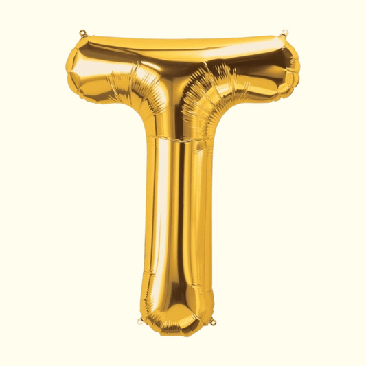 Gold letter 'T' balloon on a white background