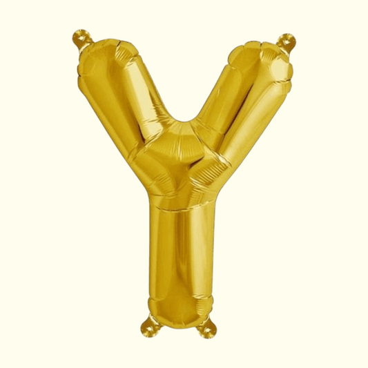 Gold letter 'Y' balloon on a white background