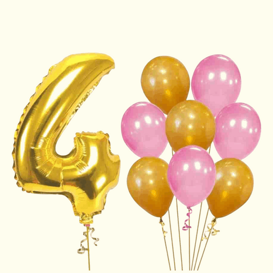 Gold and pink balloons with a large number four balloon on a white background