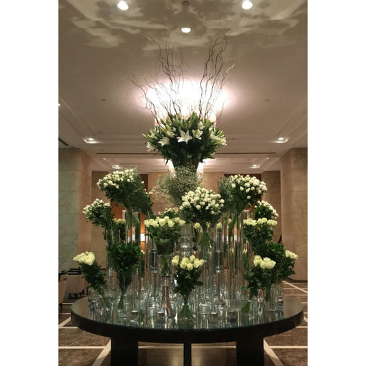 Decorative floral arrangement on a table in an indoor setting