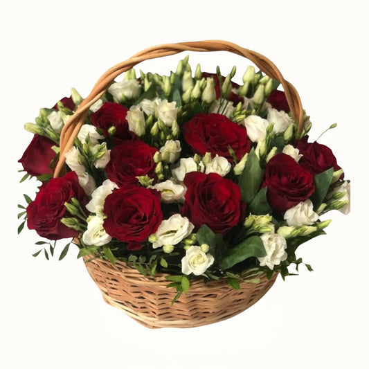 Basket of red and white flowers on a white background