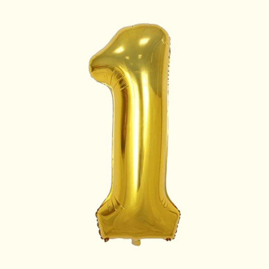 Gold number '1' balloon on a white background