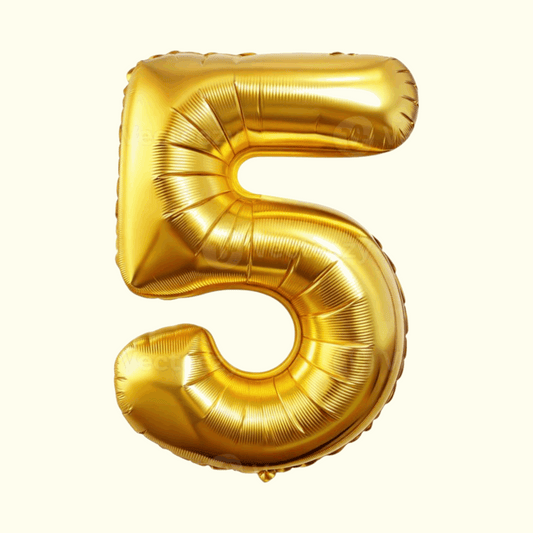 Gold number 5 balloon on a white background