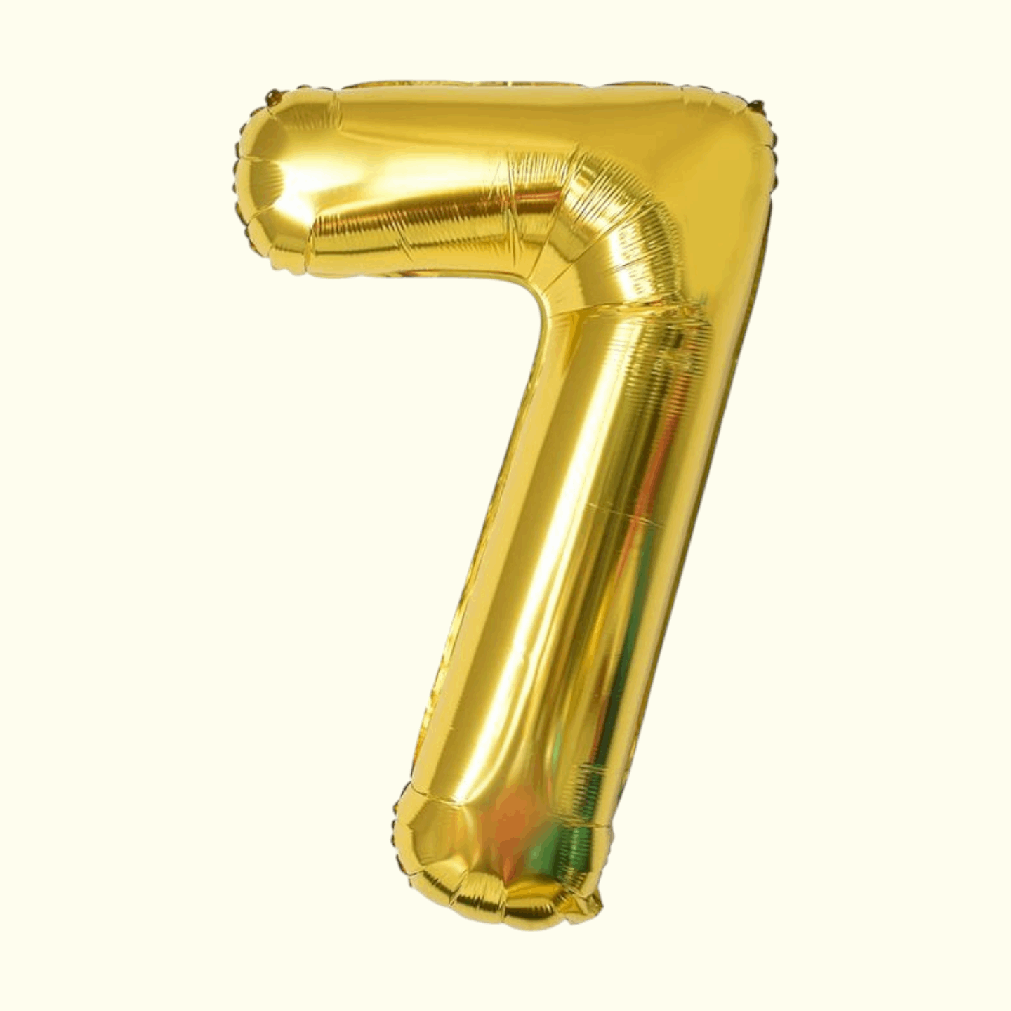 Gold number 7 balloon on a white background