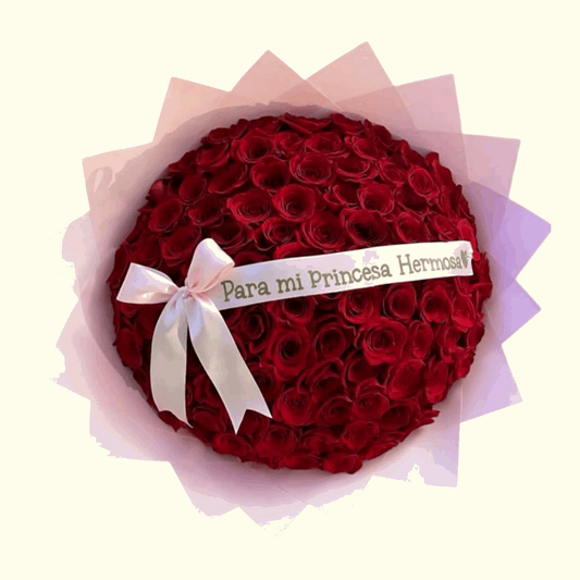 Red Roses with pink wrapping flower bouquet in Dubai, UAE 