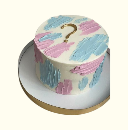 Cake with pink and blue handprints and a gold question mark 
 Best Cake Shop Dubai