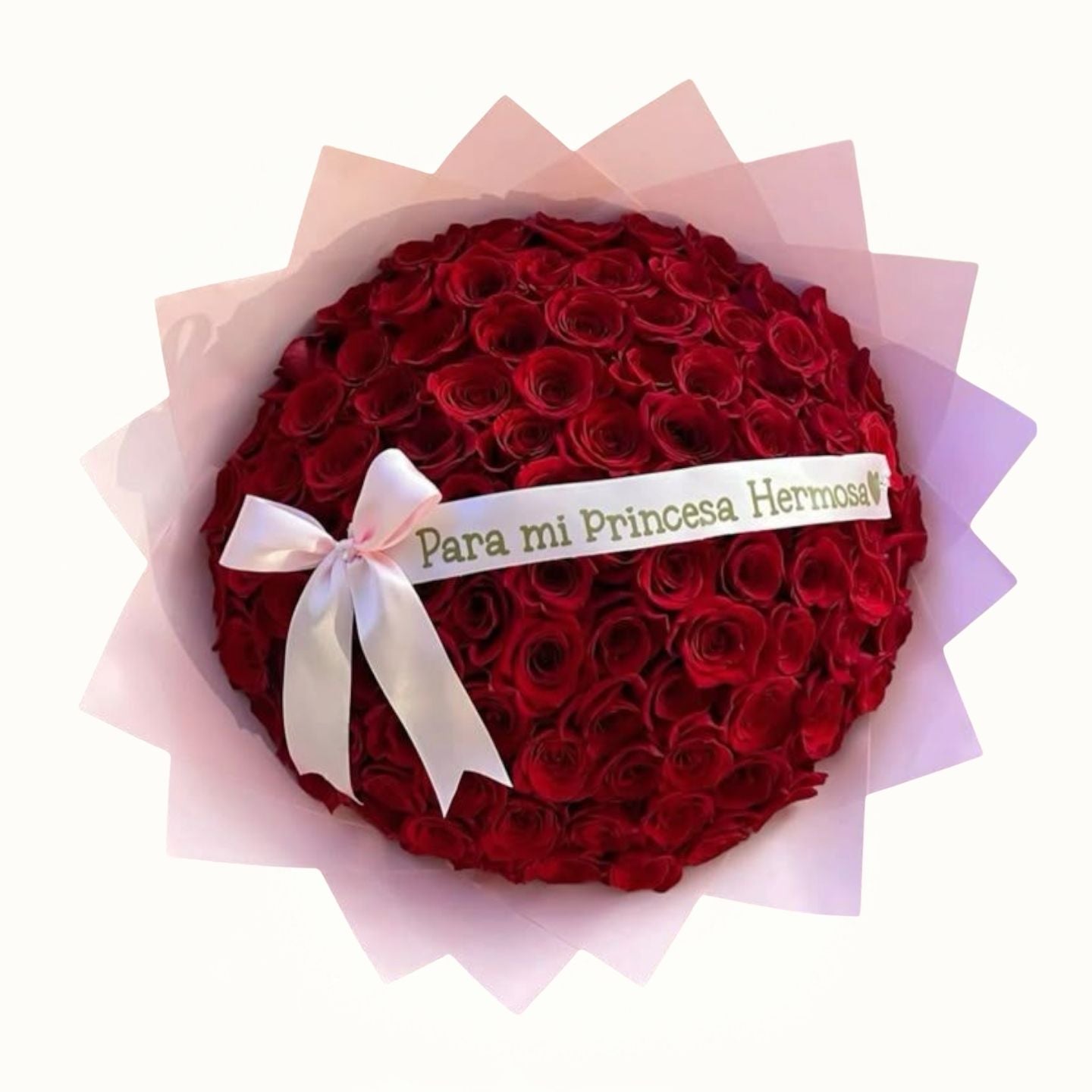 Bouquet of red roses with a white ribbon and message on a white background