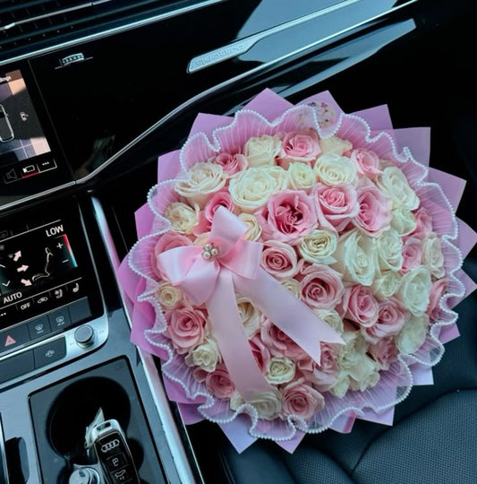 White and Pink Roses Bouquet with pink  wrapping 