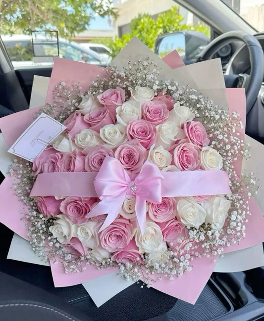 Pink and White roses bouquet with gypsophila