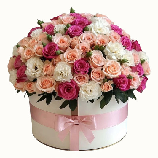 Round flower arrangement with pink, white, and peach roses in a white box with a pink ribbon | Mix Flower Box Arrangement Dubai, UAE