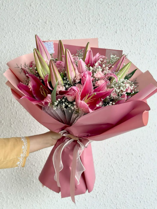 Pink Lilies Flower and Gipsofila bouquet 