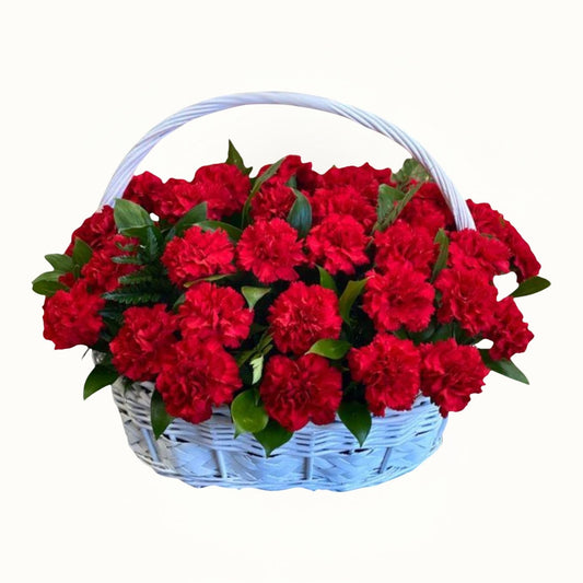 Basket of red flowers on a white background