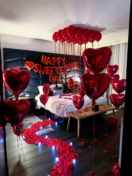Red hearts balloons and red roses bedroom decoration 