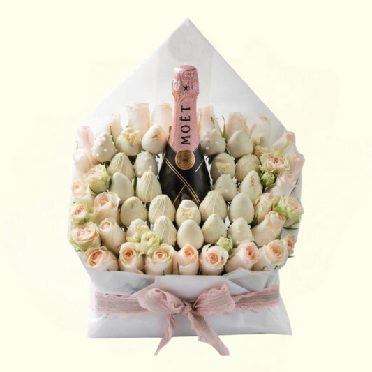 Bouquet of white roses with a Moet champagne bottle at the center 