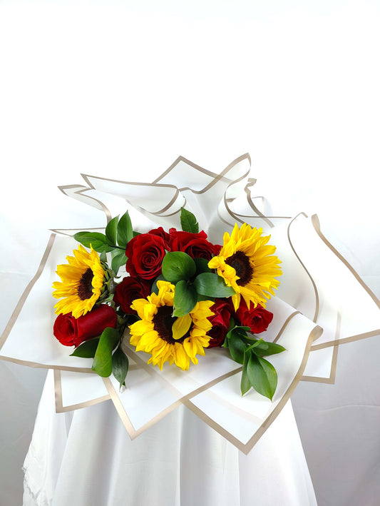 Sunflower and red roses flowers bouquet in Dubai, UAE 