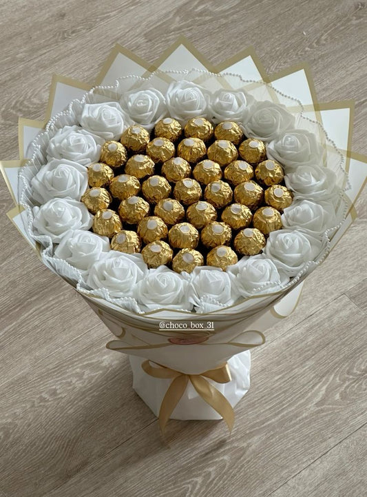 White roses and chocolates with bouquet black wrapping 